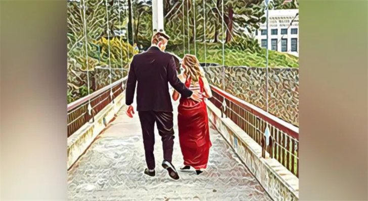 This is a photo taken earlier in the evening of Christopher and his prom date while they walked through Riverfront Park to take prom photos. Stephanie shared this photo in her Facebook post, saying it was edited with a filter called "superman."